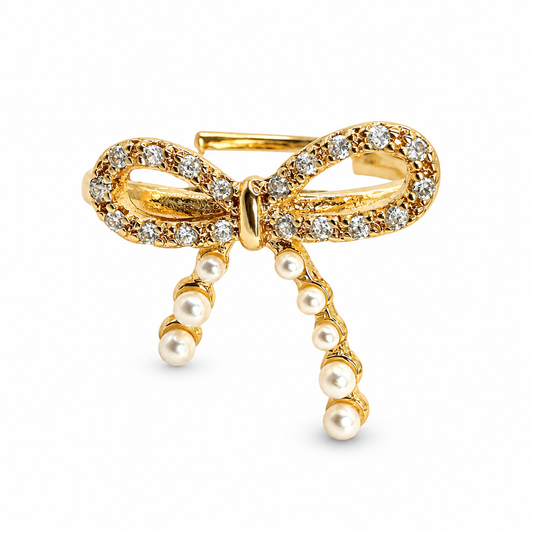 Faux Pearl Tip Pave CZ Bow Ring — luxury white background product photo