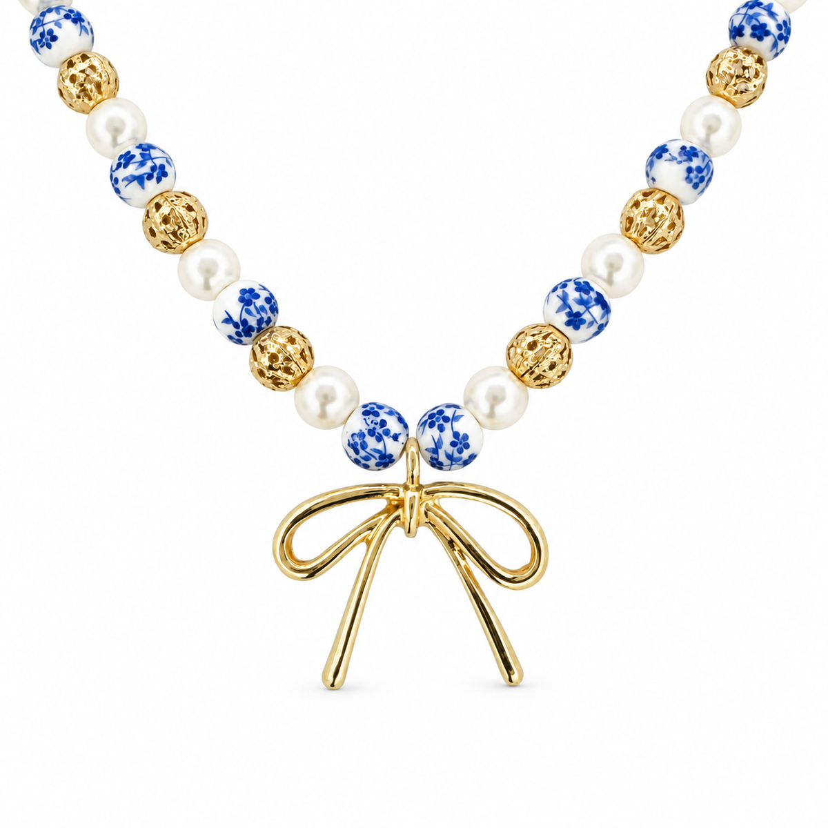 Bow, Chinoiserie, & Filigree Beaded Necklace — luxury white background product photo
