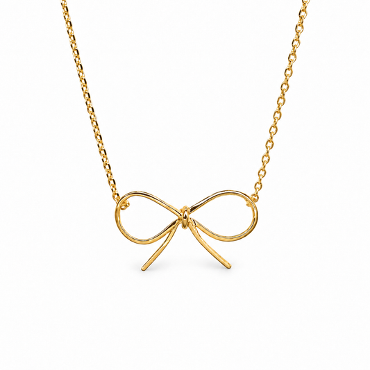 Delicate Outline Bow Festoon Necklace — luxury white background product photo